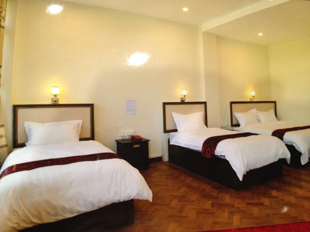 Hotel Myitkyinā Rom bilde